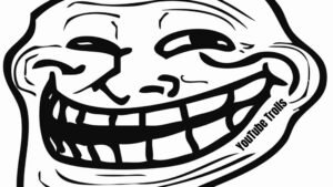 A black-and-white illustration of the classic “troll face” meme with an exaggerated grin and squinting eyes. The words “YouTube Trolls” are written diagonally across the lower-right side of the face.