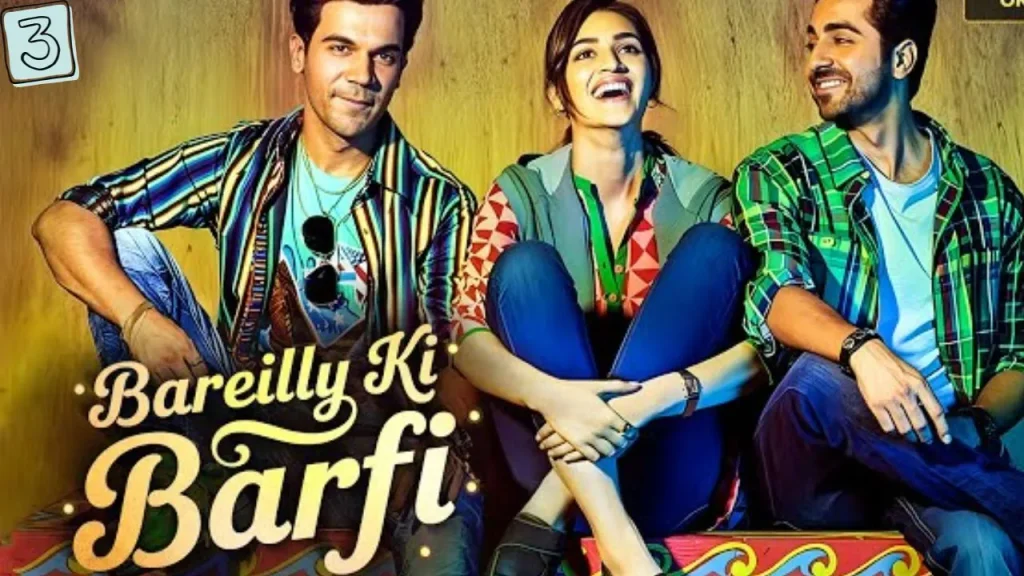 Colorful poster of Bareilly Ki Barfi (2017), featuring Kriti Sanon, Rajkummar Rao, and Ayushmann Khurrana in a cheerful romantic comedy setting.