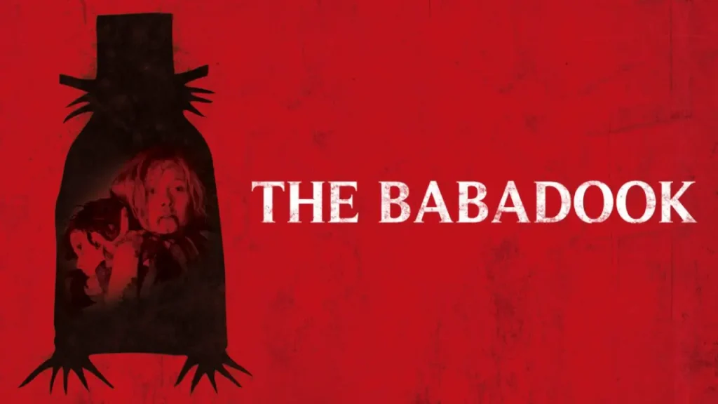 Red-and-black horror movie poster for The Babadook (2014), featuring a sinister shadow figure wearing a top hat above a frightened mother and child.